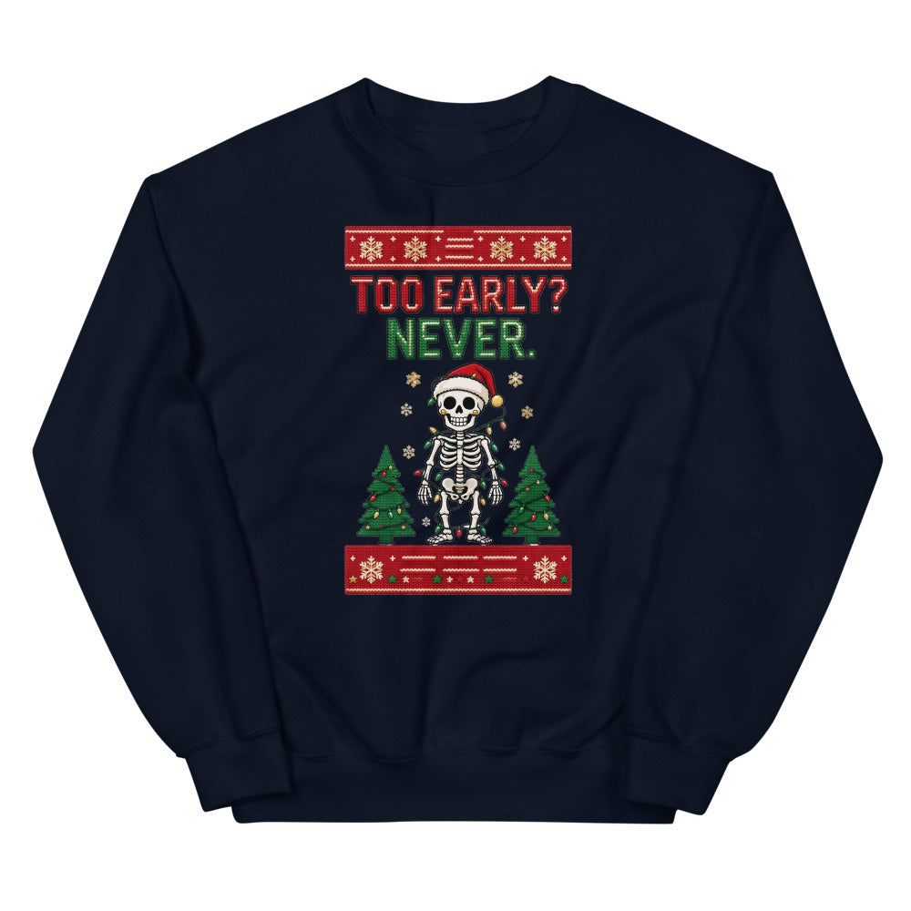 Navy crew-neck Christmas jumper with a skeleton in a Santa hat tangled in fairy lights and the words Too Early? Never.