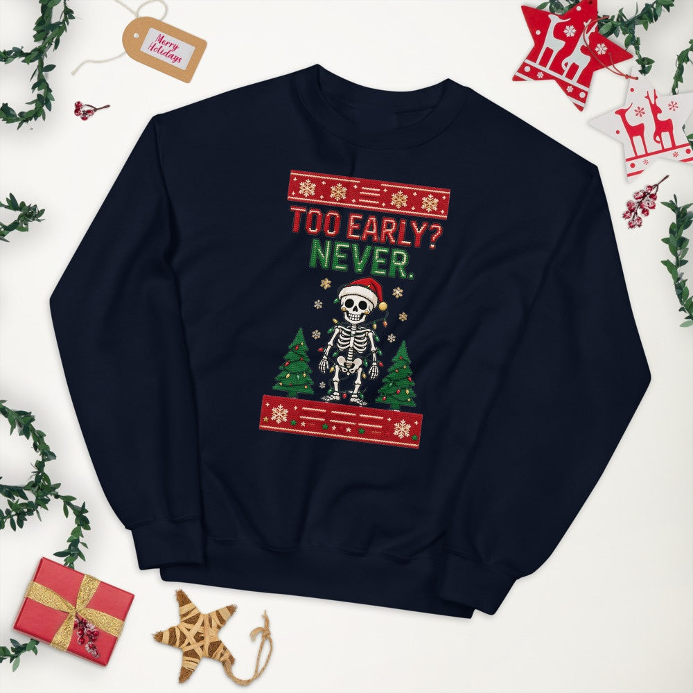 Too Early? Never. skeleton Christmas jumper laid flat on white with festive decorations