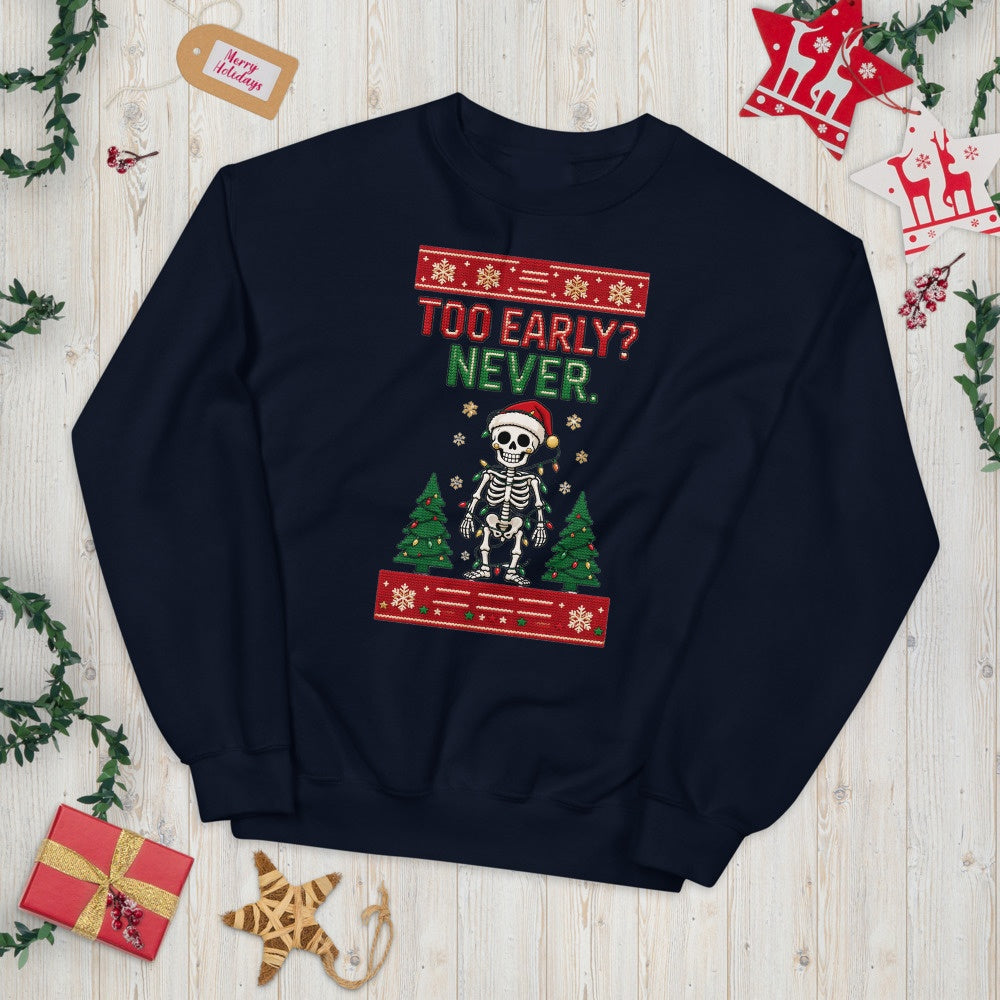 Too Early? Never. skeleton Christmas jumper laid flat on wood with festive decorations